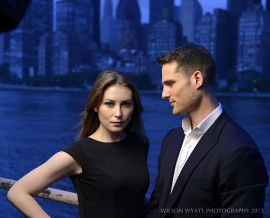 Portrait of professional models Andy Mizerek and Nastasia at night with New York background, taken from Roosevelt Island.